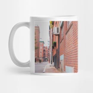 Boston back street background image with focus on foreground and blurry urban beyond Mug